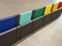 Colored waiting places for patients in corridors of a clinic